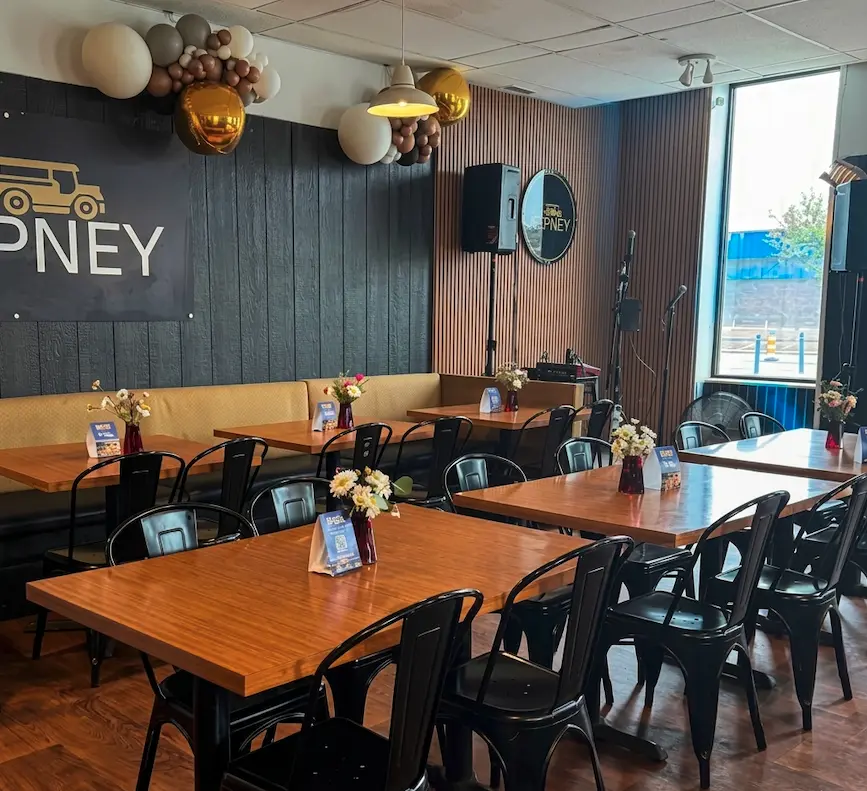 Family dining at Jeepney Winnipeg — authentic Filipino restaurant in Winnipeg